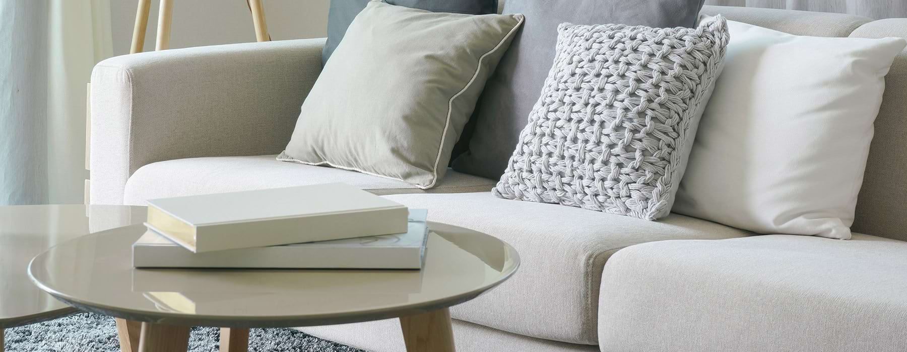 Closeup of a table in a well lit living room 